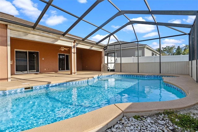 view of swimming pool featuring a fenced in pool, a patio area, and fence