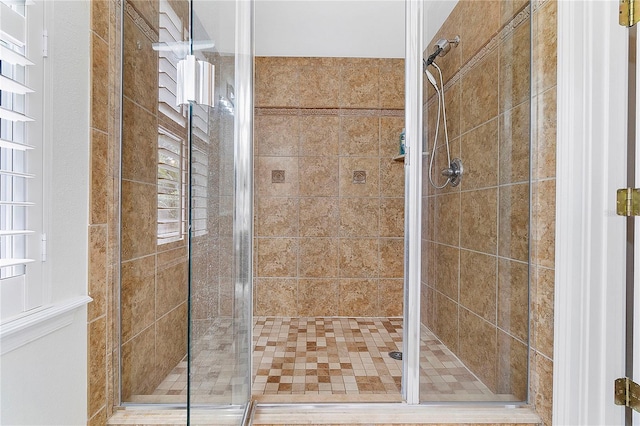 full bathroom with a shower stall