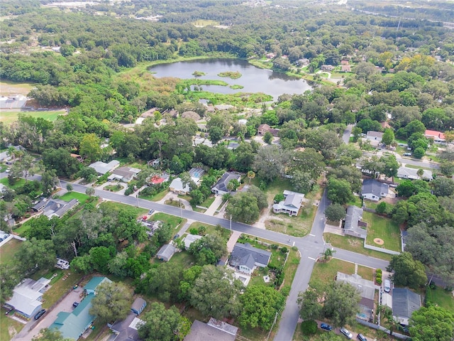 birds eye view of property featuring a residential view and a water view