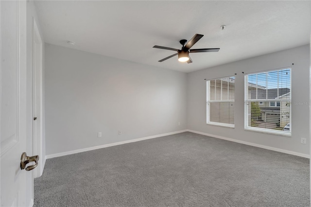 unfurnished room featuring ceiling fan, baseboards, and carpet floors