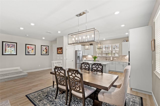 dining area with visible vents, recessed lighting, baseboards, and light wood-style floors