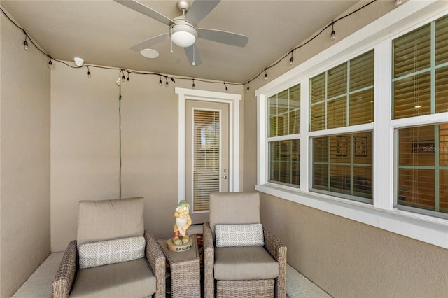 exterior space with a ceiling fan