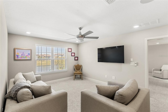 living area with a ceiling fan, carpet, visible vents, baseboards, and recessed lighting