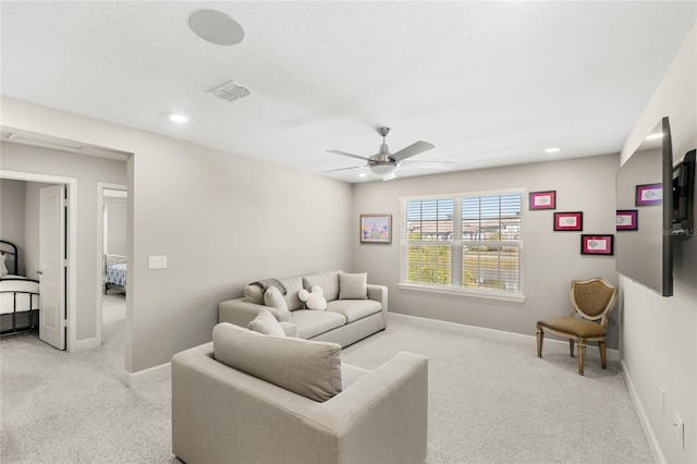 living room with a ceiling fan, recessed lighting, baseboards, and visible vents