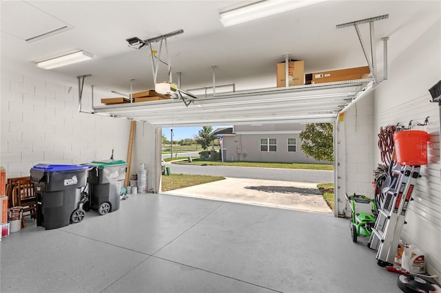 garage featuring a garage door opener