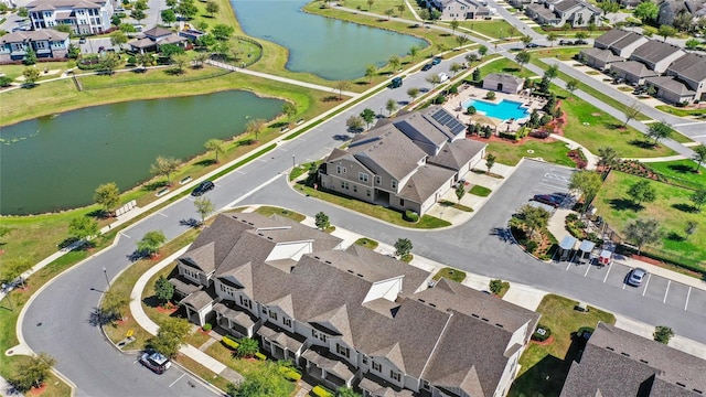 aerial view featuring a water view and a residential view