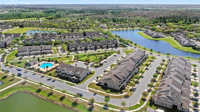 bird's eye view with a residential view and a water view