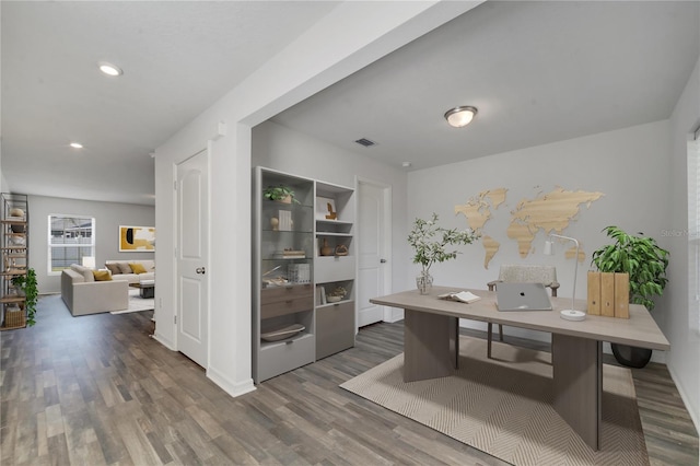 office area featuring visible vents, recessed lighting, and wood finished floors