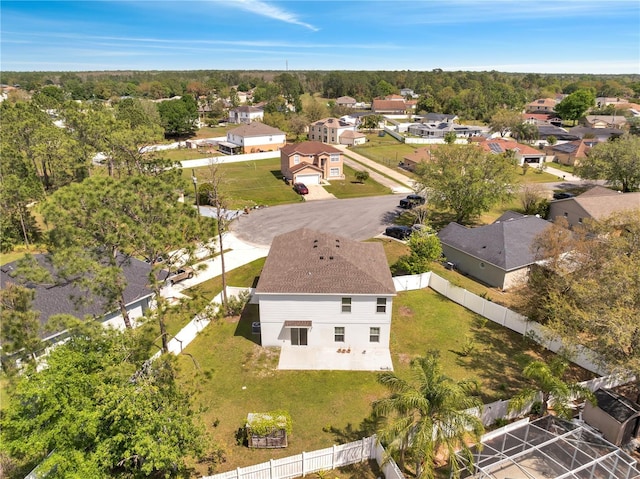 birds eye view of property with a residential view