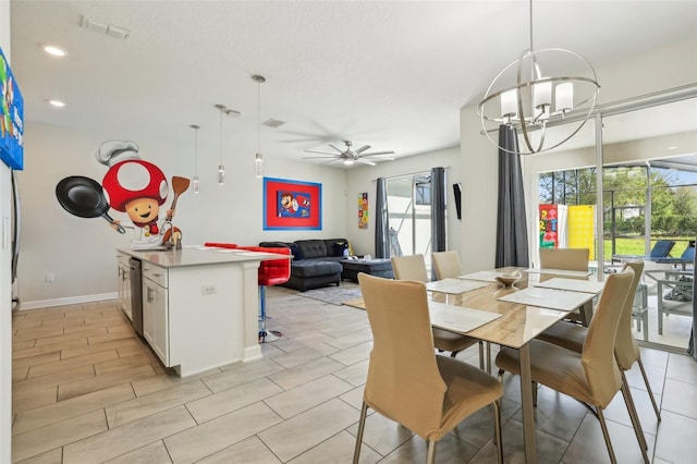 8959 Stinger Dr, Champions Gate, FL 33896 - dining space featuring ceiling fan, a chandelier, and recessed lighting
