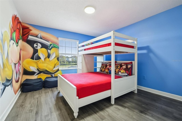 8959 Stinger Dr, Champions Gate, FL 33896 - bedroom with wood finished floors and baseboards
