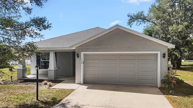 single story home with concrete driveway, an attached garage, roof with shingles, and stucco siding