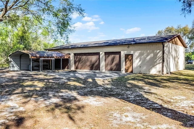 garage with driveway