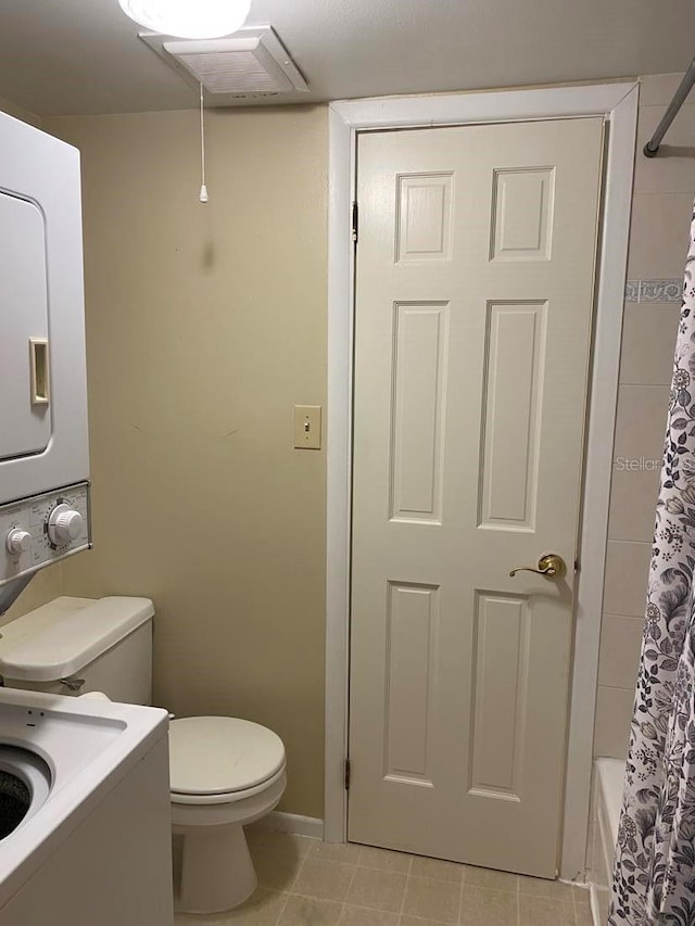 bathroom featuring tile patterned floors, toilet, and vanity