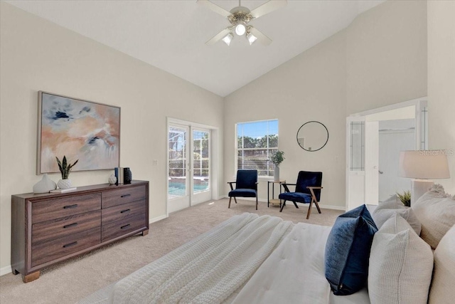 bedroom featuring a ceiling fan, baseboards, high vaulted ceiling, access to exterior, and light colored carpet