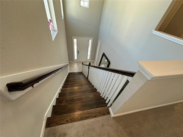 stairway with a high ceiling