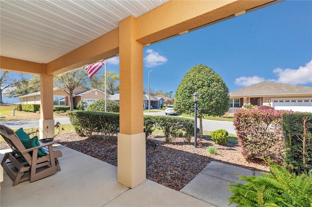 view of patio / terrace with a garage