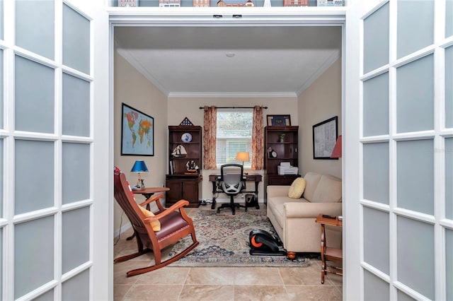 sitting room featuring tile patterned flooring and ornamental molding