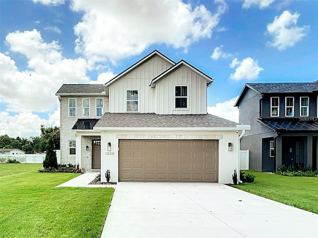 view of front facade featuring a front yard, a garage, board and batten siding, and concrete driveway