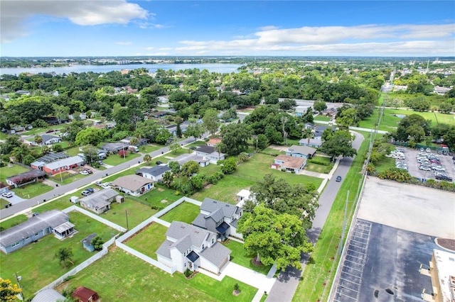 aerial view featuring a residential view and a water view