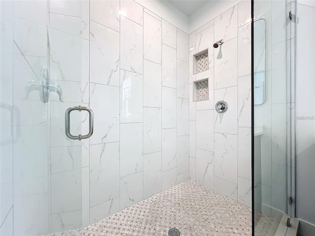 full bathroom featuring a stall shower