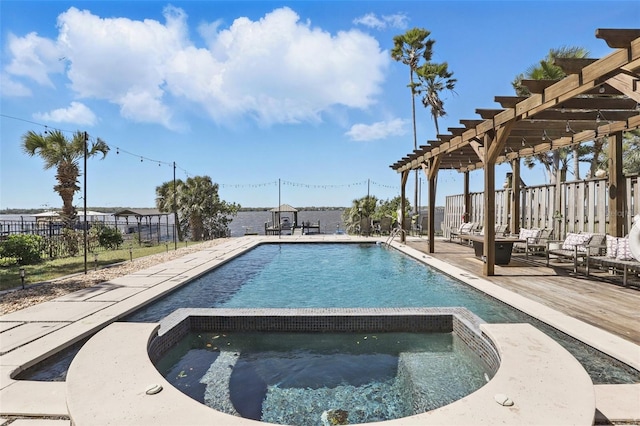 view of pool with a fenced in pool, fence, an in ground hot tub, a pergola, and a patio area