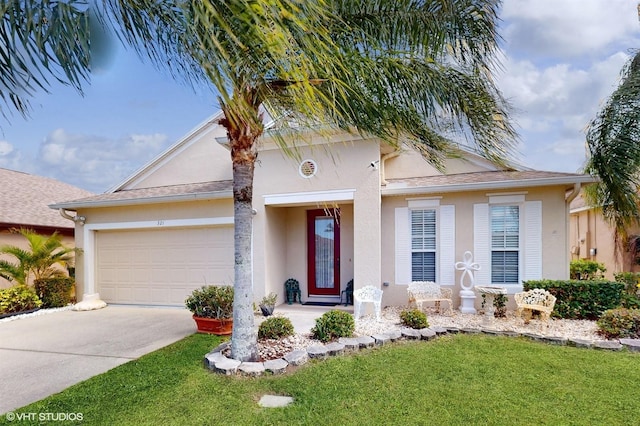 view of front of property featuring concrete driveway, a garage, a front yard, and stucco siding