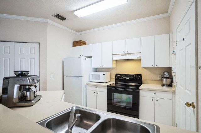 kitchen featuring visible vents, under cabinet range hood, light countertops, white appliances, and white cabinetry