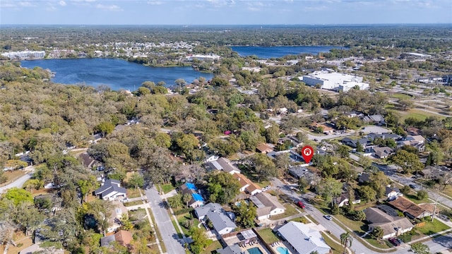 bird's eye view featuring a residential view and a water view