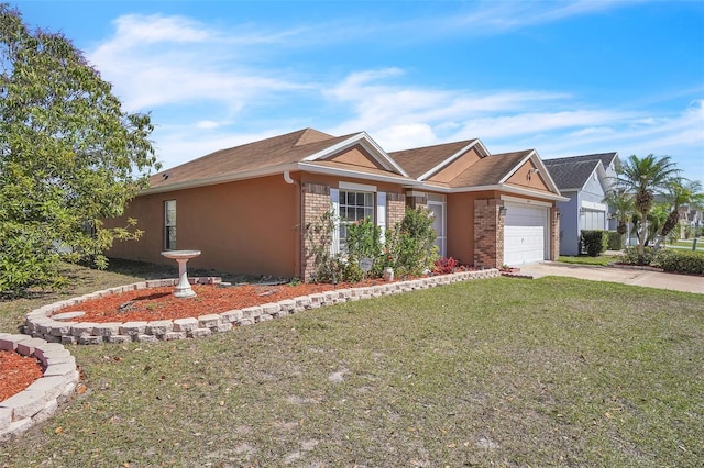 ranch-style home with stucco siding, concrete driveway, a front yard, an attached garage, and brick siding