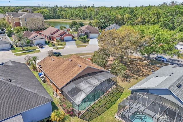 aerial view with a residential view and a water view