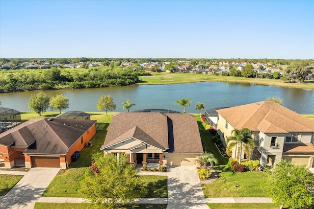 aerial view featuring a residential view and a water view