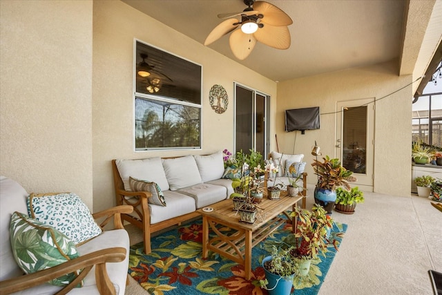 view of patio with outdoor lounge area and a ceiling fan