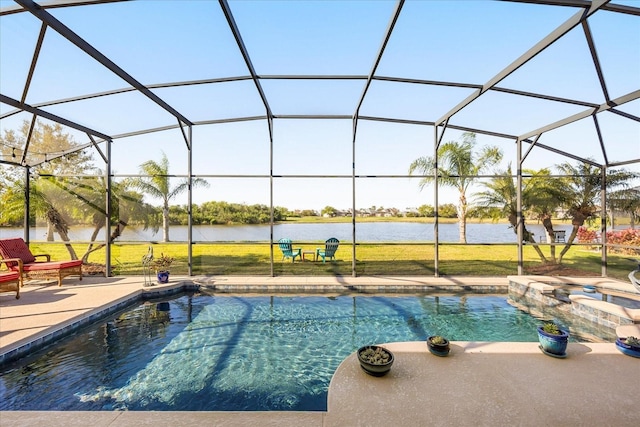 view of swimming pool with a water view, a lawn, a pool with connected hot tub, a patio, and a lanai