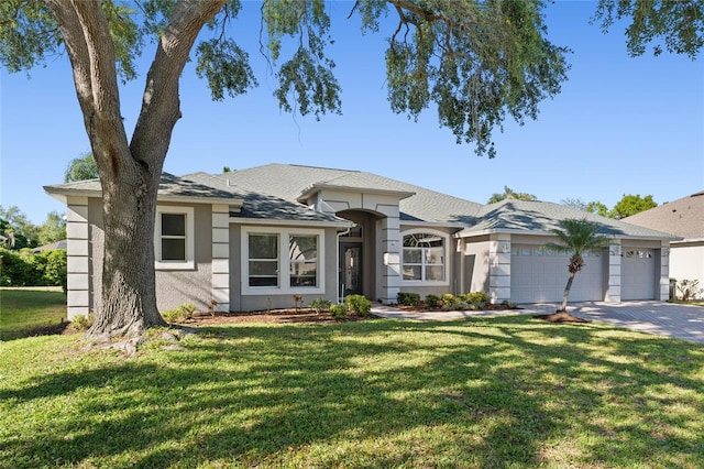8611 Dover Oaks Ct, Orlando, FL 32836 - prairie-style home with stucco siding, driveway, an attached garage, a front lawn, and a shingled roof