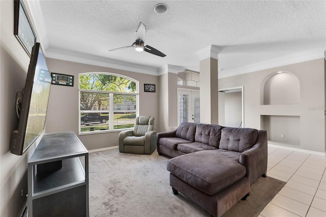 8611 Dover Oaks Ct, Orlando, FL 32836 - living room with tile patterned floors, baseboards, ornamental molding, and ceiling fan