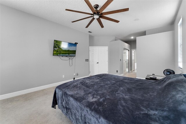 8611 Dover Oaks Ct, Orlando, FL 32836 - carpeted bedroom with visible vents, baseboards, and a ceiling fan
