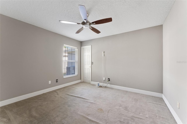 8611 Dover Oaks Ct, Orlando, FL 32836 - spare room with ceiling fan, light colored carpet, baseboards, and a textured ceiling