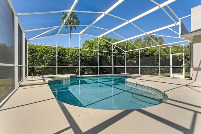 8611 Dover Oaks Ct, Orlando, FL 32836 - view of pool featuring glass enclosure, a fenced in pool, and a patio