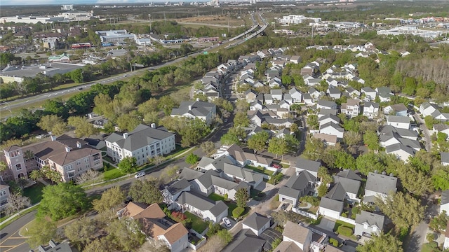 birds eye view of property with a residential view