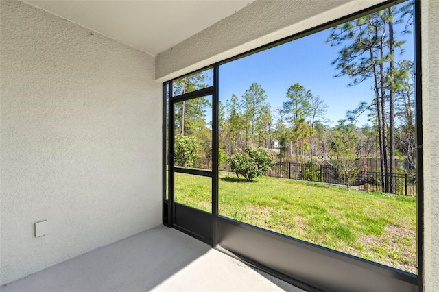 unfurnished sunroom with a healthy amount of sunlight