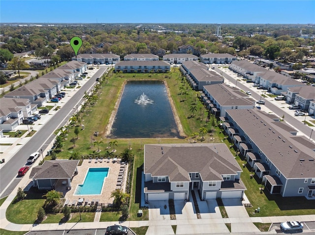 aerial view with a water view and a residential view