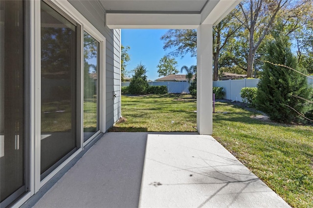 view of patio / terrace featuring fence