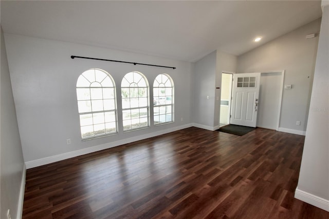 entryway featuring lofted ceiling, recessed lighting, dark wood-style floors, and baseboards