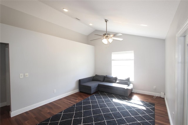 sitting room with vaulted ceiling, wood finished floors, and baseboards