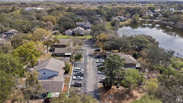 birds eye view of property featuring a residential view and a water view