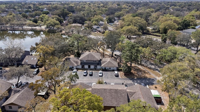 birds eye view of property featuring a residential view and a water view