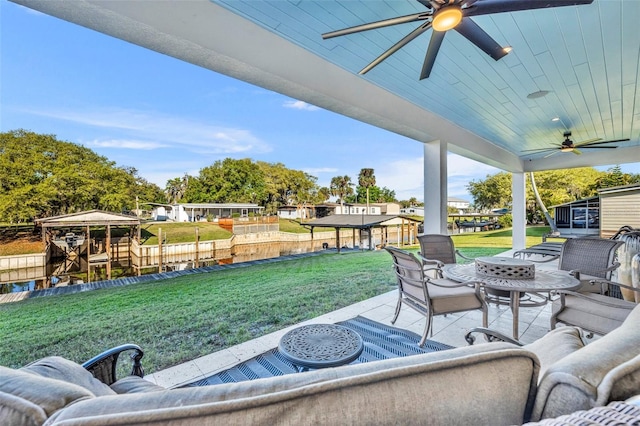 view of patio / terrace featuring an outdoor living space and a ceiling fan