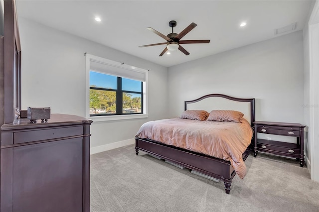 carpeted bedroom featuring visible vents, recessed lighting, a ceiling fan, and baseboards