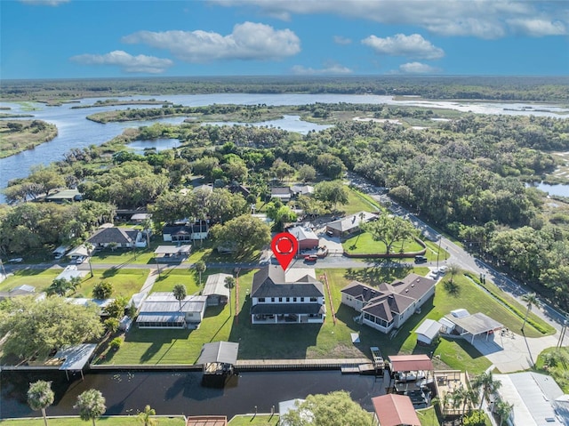 aerial view with a residential view and a water view